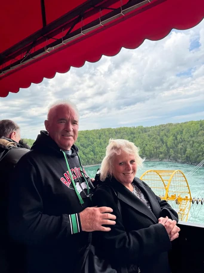 Couple posing on the Whirlpool Aero Car platform
