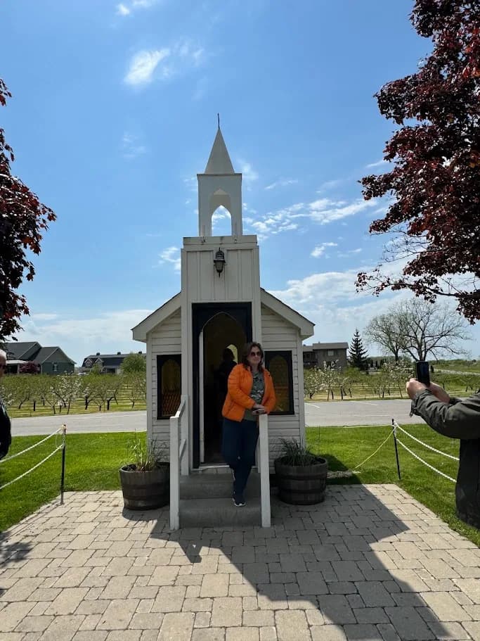 Guest standing in the doorway of the small Niagara chapel