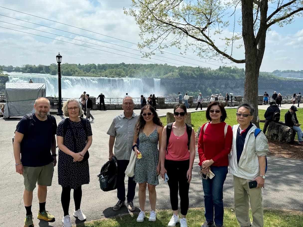 Tour Niagara guests posing near Niagara Falls during a private sightseeing stop