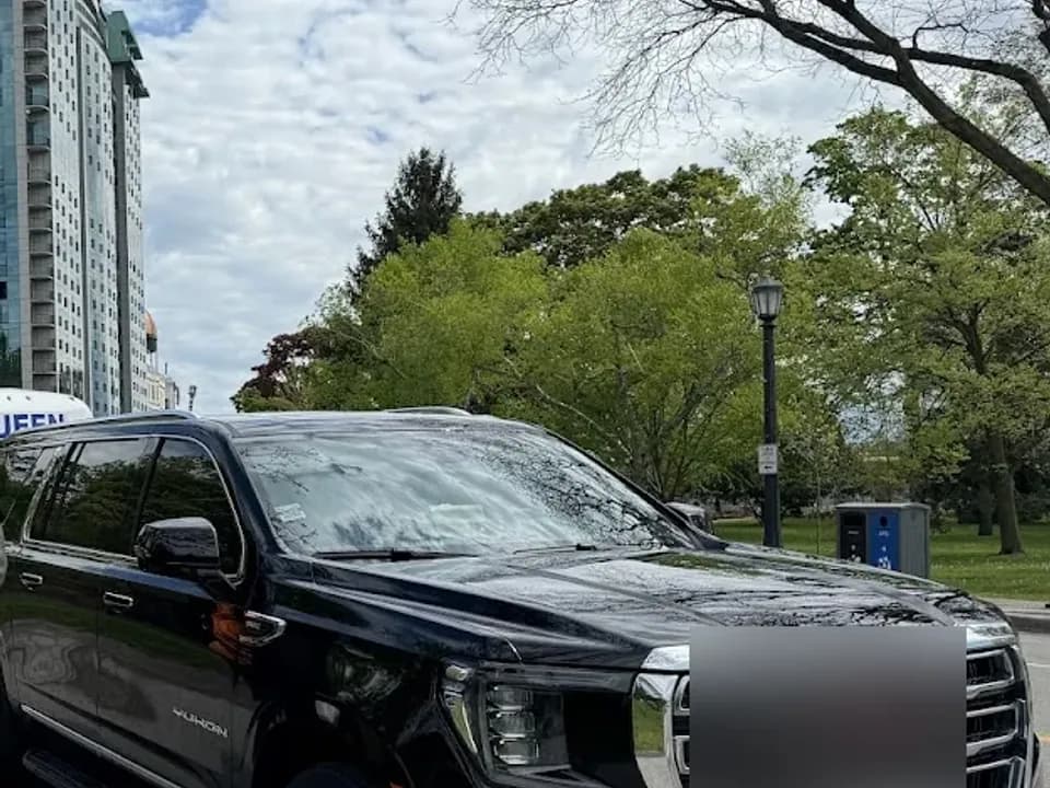 Black luxury SUV in a Toronto pickup setting